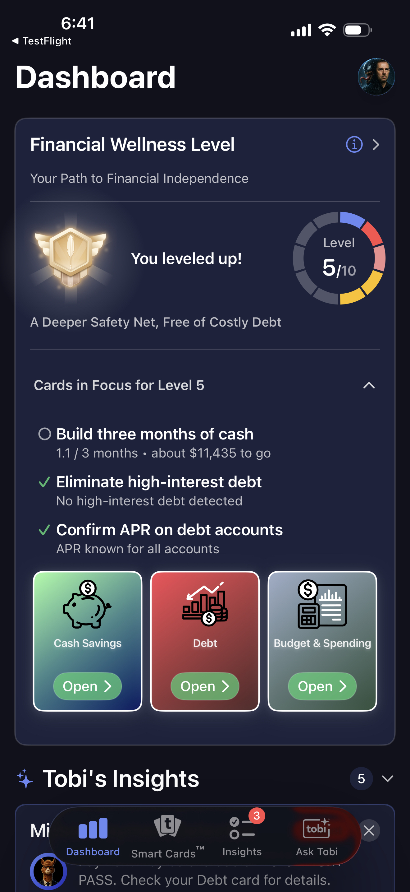 Tobi dashboard showing Financial Wellness Level 5 of 10, with the cards in focus for that level
